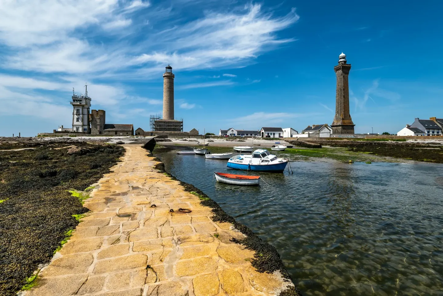 Two harbor entrance lighthouses in Brittany, France
